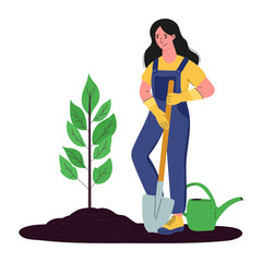 A woman is planting a small tree in the garden.