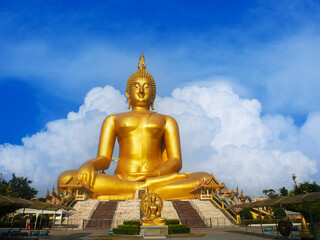 Fototapeta premium Beautiful big buddha on beautiful sky background, Wat Muang, Ang Thong Province, Thailand