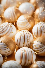 Fototapeta premium White and gold colored luxury elegantly bonbons for Christmas and cozy blur background
