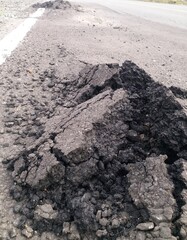 asphalt road on damaged highway