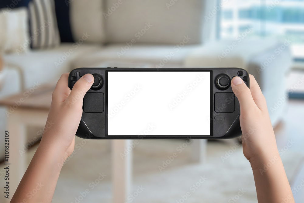 Poster flat lay or front view of hands holding a black handheld gaming console with isolated screen, cozy l