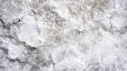 Natural stone texture with light and dark patterns in a close-up shot of the surface
