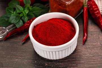 Spicy dry paprika powder in the bowl