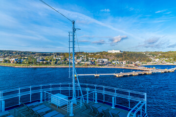 A view from a docking ship approaching the cruise terminal in the bay at Saguenay, Quebec in Canada in the fall