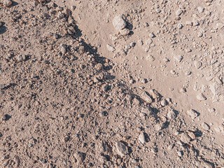 Background of stones on sand. Desert landscape. Alien view. Space surface. Day. Autumn. Egypt.