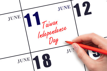 June 11. Hand writing text Taiwan Independence Day on calendar date. Save the date.