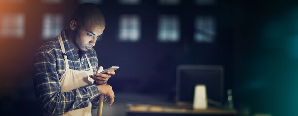 Night, mobile phone and man for communication, network or inventory as small business owner. Male...