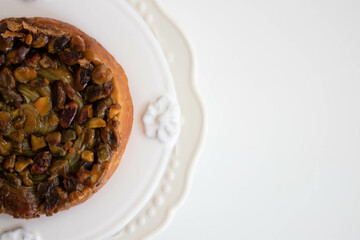 Close up Pistachio Kouign Amann, sweet Breton cake , French Pastry