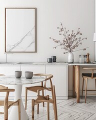 A modern kitchen with a round dining table. two chairs. a plant. and a blank picture frame