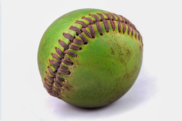 Softball on a white background, isolated for clarity, featuring vibrant colors and detailed stitching.