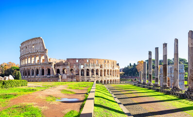 Road to Colosseum from Roman Forum in Rome, Italy. Ancient Roman ruins of Colosseum (Coliseum), amazing landscape of old Rome city, Italy.
