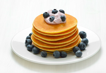 Pancakes with fruit yogurt and blueberry