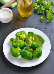 Broccoli on white plate