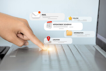 A person is pointing at a laptop screen with a calendar, appointment, and location icons. Concept...