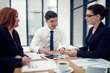Teamwork, tablet and research with business people in meeting for partnership, data analytics and company revenue. Client feedback, admin stats and mentor with employees in office for planning
