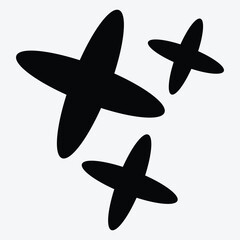 Three abstract black shapes resembling stars or crosses on a light background.