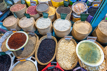 Spice and seeds stall at a traditional Arabic market in the medina of Sfax.