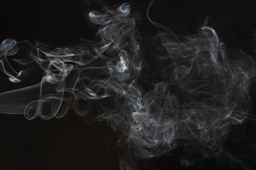 Flowing white smoke close up view