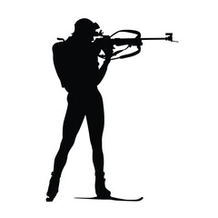 biathlon player shooting dark