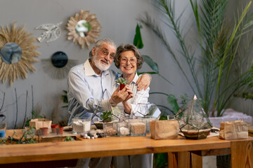 master class on creating compositions with plants for elderly people happy old age elderly couple pleasant memories leisure time in old age hugs each other