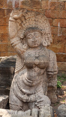 India, Tamil Nadu, Carving Sculpture of Ancient Dancer of Shri Bragathambal Temple, Pudukkottai. 