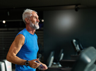 gym sport fitness exercising training mature man running cardio treadmill healthy active  adult mid aged middle age equipment athletic run coach fit endurance