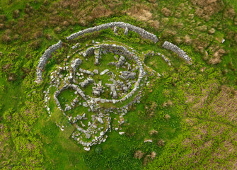 Bagh nam Feadhag pre-wheelhouse through Viking site. Mainly visible is Iron Age wheelhouse. Grimsay, Outer Hebrides. Outer semi-circle wall is modern © David Matthew Lyons