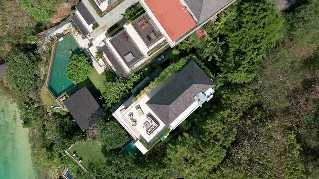 Above View Of Luxurious Exclusive Resorts In Padang Padang Beach, South Bali, Indonesia. Aerial Drone Shot