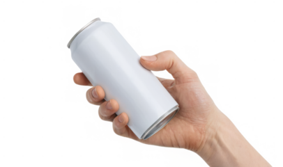 Hand holding white plastic soda can against transparent background in close-up shot with fingers curled around can.