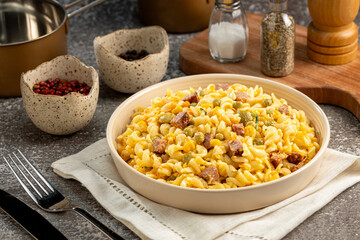 Plate of pasta salad on the table. Macaroni salad.