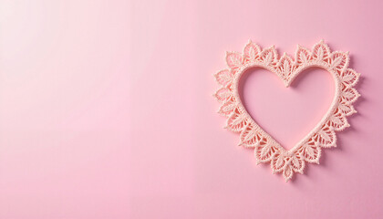 Lace heart decoration on soft pink background for romantic themes and creative design with copy space, Valentine's Day Celebration background