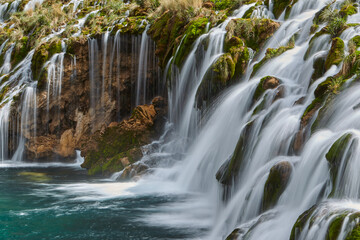 Fototapeta premium Nature’s symphony in full display. The breathtaking beauty of Huancaya Falls is like stepping into a dream. Nor Yauyos Lima Peru