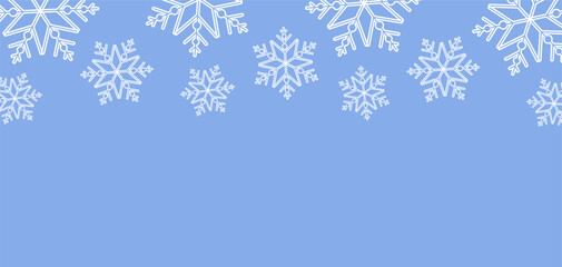 Fototapeta premium Horizontal background with white snowflakes. Christmas, New Year or simply winter theme banner with empty space for text.