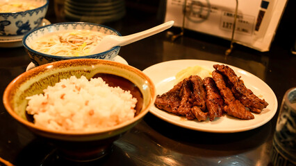 Beef tongue steak grilled serve with rice and vegetable, Sendai beef steak, tender, Local food in Sendai Japan, travel destinations meal. Japanese restaurant menu cookery.