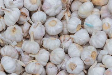 Pile of garlic with abstract shapes. Garlic for cooking seasoning.