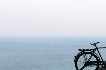 bicycle on the cliff at the seaside