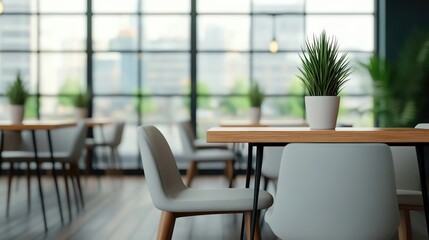 Fototapeta premium Modern cafe interior featuring cozy seating, wooden tables, and natural light from large windows, creating a welcoming atmosphere.
