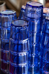 stack of blue plastic cups
