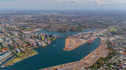 Fototapeta premium Aerial View of Sydney Harbour Balmain Darling harbour Sydney CBD cockle Bay Wharf North Sydney harbour bridge Lavender Bay Milsons Point Manly on a warm summer day blue skies 