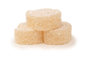 Coconut candy roll isolated on a white background.
