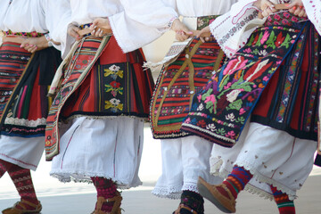 Vlach Traditional Folk Clothing with Embroidered Skirts and Floral Motifs