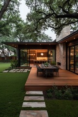 Elegant Outdoor Dining Experience at Dusk in Modern Luxury Home with Glass Doors, Tranquil Residential Setting