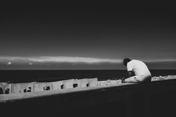 silhouette of a person on sea