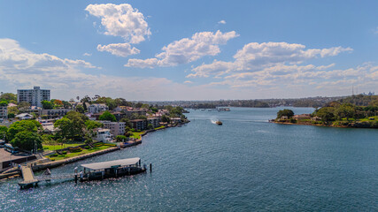 Aerial View of Sydney Harbour Balmain Darling harbour Sydney CBD cockle Bay Wharf North Sydney harbour bridge Lavender Bay Milsons Point Manly on a warm summer day blue skies 