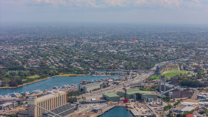 Aerial View of Sydney Harbour Balmain Darling harbour Sydney CBD cockle Bay Wharf North Sydney harbour bridge Lavender Bay Milsons Point Manly on a warm summer day blue skies 