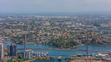 Aerial View of Sydney Harbour Balmain Darling harbour Sydney CBD cockle Bay Wharf North Sydney harbour bridge Lavender Bay Milsons Point Manly on a warm summer day blue skies 