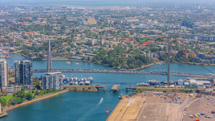Obraz premium Aerial View of Sydney Harbour Balmain Darling harbour Sydney CBD cockle Bay Wharf North Sydney harbour bridge Lavender Bay Milsons Point Manly on a warm summer day blue skies 