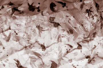 Creative abstract watercolor painting on crumpled wet paper. Background with blurred shapes for your creative work or design.