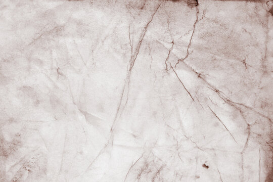 Abstract background with watercolor paints on crumpled wet paper. Drawing with unusual patterns for your creative work or design.