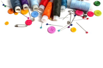 Sewing supplies lie on a white background.